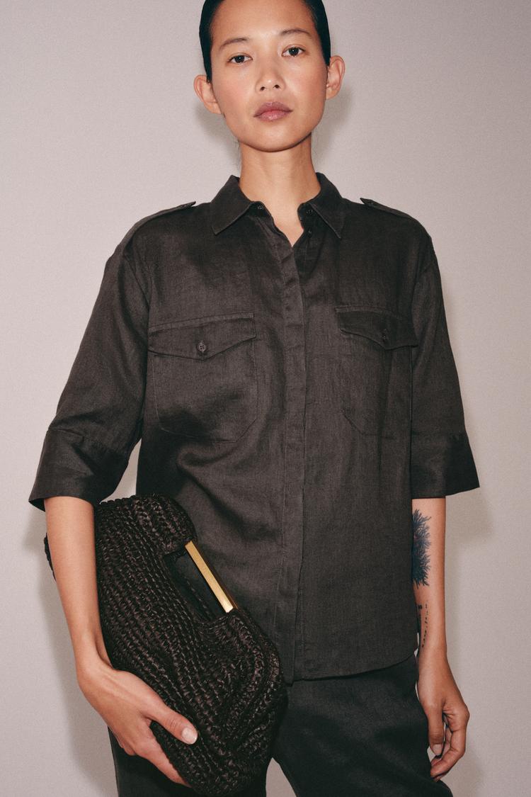 BOLSA CLUTCH CON CORPO TRENZADO